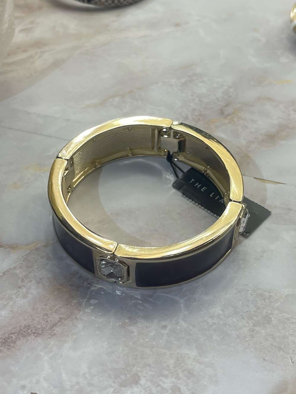 enamel and gold-tone hinged fashion bangle from the brand The Limited